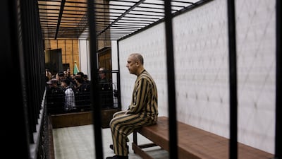 Atif Najib, a former army brigadier general and head of political security in Deraa, at a trial session at the Palace of Justice in Damascus on Sunday. Reuters