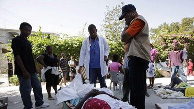 Dr Surena, right, converted his property into a field hospital for more than 100 injured people.