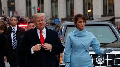 US President Donald Trump and Melania Trump, in Ralph Lauren, during the Inaugural Parade after he was sworn in as the 45th President of the United States in Washington DC, US, on January 20, 2017. EPA