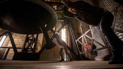 Bell ringers inside the bell tower of St Vitus Cathedral at Prague Castle during midnight Mass. EPA