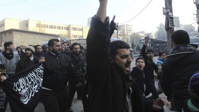 Civilians carry copies of the Koran and shout slogans as they march to demonstrate against the rebel infighting in Aleppo January 6, 2014. In the last few days Syrian rebel factions battled fighters from the Islamic State in Iraq and the Levant (Isil) across northern and eastern Syria. Jalal Alhalabi / Reuters