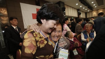North Korean Rim Ok Rae, right, meets with her South Korean nephew Kim Mi-sook at Diamond Mountain resort in North Korea. AP