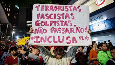 Demonstrators accuse Bolsonaro supporters of trying to stage a coup. Bloomberg