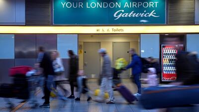 Passengers walk through the South Terminal building at Gatwick Airport, France's Vinci has taken majority stake in Gatwick with £2.9bn acquisition. Reuters.