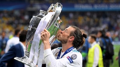 Gareth Bale kisses the Uefa Champions League trophy following Real Madrid's win over Liverpool at NSC Olimpiyskiy Stadium in Kyiv on May 26, 2018. Getty