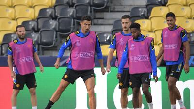 United’s Christiano Ronaldo with Juan Mata, left, midfielder Fred, second right, and Raphael Varane, right. AFP