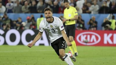Germany's Jonas Hector celebrates after scoring the winning penalty against Italy in the Euro 2016 quarter-final on Saturday night. Antonio Calanni / AP Photo / July 2, 2016