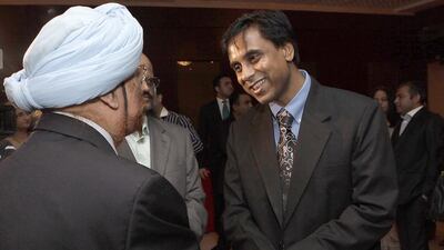 Anurag Bhushan, the new Indian consul general, right, meets business leaders in Dubai this week. Jeffrey E Biteng / The National
