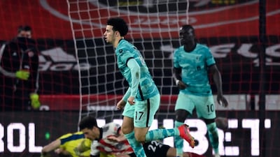 Liverpool's Curtis Jones celebrates scoring his side's first goal. AP