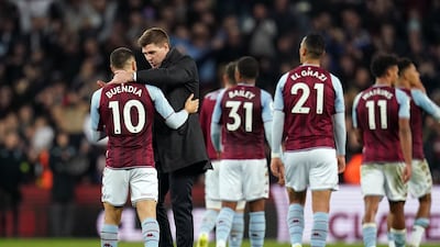 Aston Villa's Emiliano Buendia with manager Steven Gerrard following their win at Villa Park on Saturday. PA