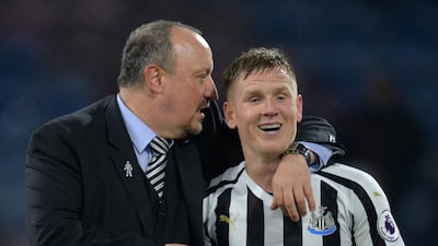Newcastle United manager Rafael Benitez, left, and Matt Ritchie celebrate after defeating Burnley. Reuters