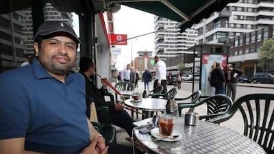 Emirati Ahmed Salem has a coffee at an Edgware Road cafe in London.