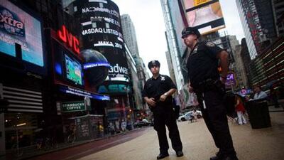 New York police stand guard in Times Square.
