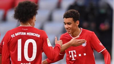 Bayern's Jamal Musiala (R) celebrates scoring the fifth. EPA