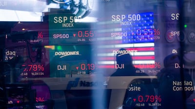 Monitors display stock market information at the Nasdaq MarketSite in New York, US, on January 21, 2022. Bloomberg