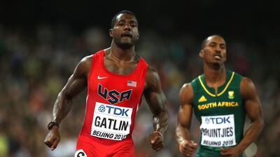 Justin Gatlin of the United States, left, and Henricho Bruintjies of South Africa compete in the 100 metres heats on Saturday at the 2015 World Championships in Beijing. Andy Lyons / Getty Images