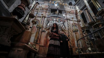 Meza visits the Jesus Tomb inside the Church of the Holy Sepulcher. EPA