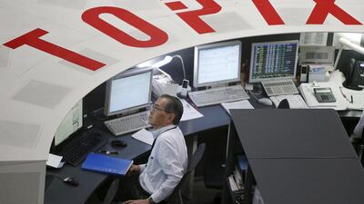 Tokyo's benchmark stock index Nikkei 225 dropped more than 4 per cent to finish at a six-month low of 18,540.68 on Monday. Toru Hanai / Reuters