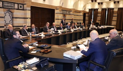 Handout pictures provided by the Lebanese photo agency Dalati and Nohra on October 17, 2019 shows Lebanese Prime Minister Saad Hariri (C) chairing a cabinet session at the Grand Serail in central Beirut.