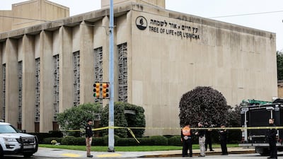 Police officers guard the Tree of Life synagogue following the shooting. Reuters