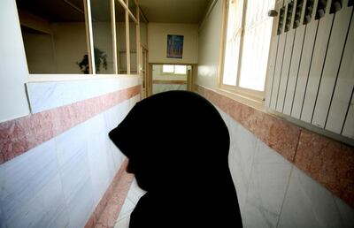 A female prison guard stands in a corridor in Tehran's Evin Prison in 2006. Reuters