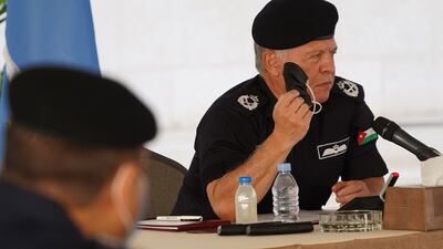 A handout picture released by the Jordanian Royal Palace shows Jordanian King Abdullah II, who is the Supreme Commander of the armed forces, addressing police at the Public Security Directorate in Amman. AFP