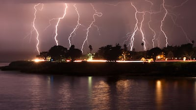 A rare lightning storm crackles over Mitchell's Cove in early morning in Santa Cruz, California in August. AP