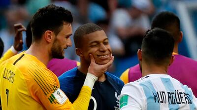 Kylian Mbappe, centre, won the penalty for France's first goal and scored their third and fourth in a 4-3 victory over Argentina. Yuri Kochetkov / EPA
