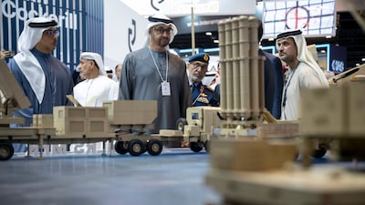 The President and Sheikh Mansour bin Zayed, Deputy Prime Minister and Minister of the Presidential Court, during a tour of Idex
