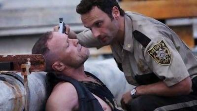 Andrew Lincoln, right, in a scene from the television series The Walking Dead.