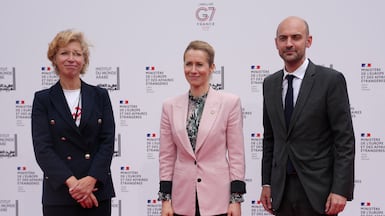 French Foreign Minister Jean-Noel Barrot, right, and EU foreign affairs chief Kaja Kallas, centre, welcomed Palestinian and Israeli activists in Paris. Reuters