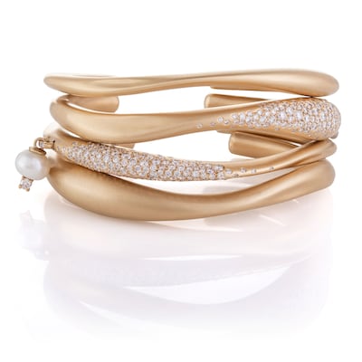 18k Yellow Gold Floating Joy Cuffs with Champagne Diamonds, £67,440 by Nada Ghazal. Photo: Nada Ghazal