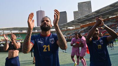 Cape Verde's 21 Bebe celebrates with teammates after the match. AFP