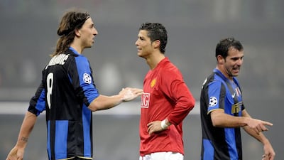 Portugal’s Cristiano Ronaldo, centre, will meet Sweden’s Zlatan Ibrahimovic, left, on Friday night in the first leg of their 2014 World Cup qualifier. Damien Meyer / AFP