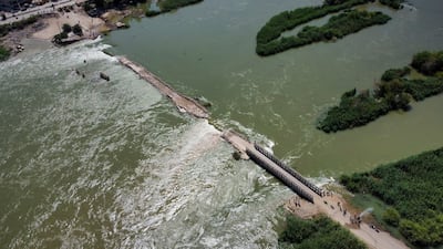 Floodwater swept away parts of the earth bridge at Al Siyasiya crossing in Deir Ezzor, forcing residents to rely on river ferries to cross the Euphrates. Sana