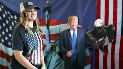 Amber Morris watches as the polls come in at Trump International Golf Club in Dubai.