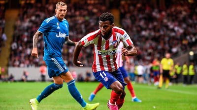 Atletico Madrid's midfielder Lemar controls the ball. AFP