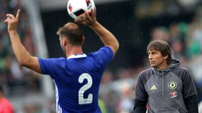 Antonio Conte looks on as Chelsea defender Branislav Ivanovic takes a throw-in. Lisi Niesner / EPA
