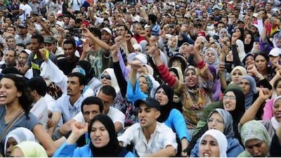 Members of the Islamist movement Al Adl Wal Ihssane (Justice and Charity) protest in the streets of Casablanca on Sunday against the new constitution. Al Adl Wal Ihssane is a part of a coalition that forms the opposition movement February 20 Selmaoui-Karim / EPA