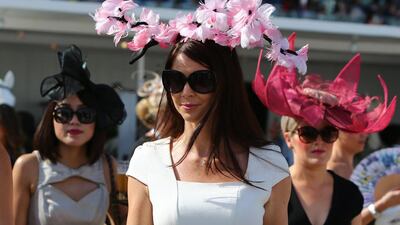 Guests arrive at the Meydan racecourse before the start of the Dubai World Cup. Marwan Naamani / AFP Photo
