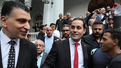 Supporters surround Ahmed Tantawy before a press conference called by opposition parties in Cairo last month. Reuters