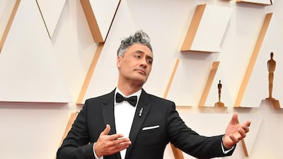 Taika Waititi, wearing Dior, arrives at the Oscars on Sunday, February 9, 2020, at the Dolby Theatre in Los Angeles. AFP