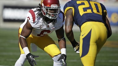 USC cornerback Josh Shaw, left. AP Photo/Eric Risberg