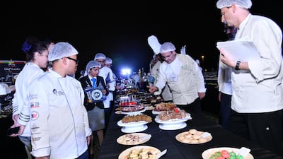 World of Food Abu Dhabi food festival served a record-breaking buffet of 2,586 desserts at Umm Al Emarat park on December 7, 2019