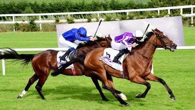 Magical, ridden by Seamus Heffernan, beats Ghaiyyath to win the Group 1 Irish Champion Stakes on day one of the Longines Irish Champions Weekend at Leopardstown Racecourse. PA