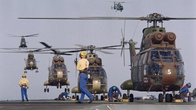 In this August 28, 1990 photo, helicopters land on the deck of the French aircraft carrier Clemenceau, casting off Djibouti, as French army was deployed in the Persian Gulf since Iraq's invasion of Kuwait on August 2. AFP