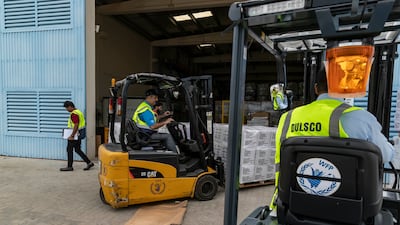 Eight lorries are being loaded with supplies in total