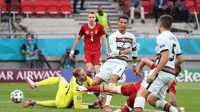 Cristiano Ronaldo scores his second and Portugal's third goal. Getty