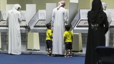 Voters cast their ballots at the Fujairah polling station. Antonie Robertson / The National