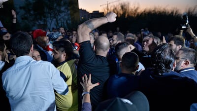 Supporters of the Lebanese President Michel Aoun (R) scuffle with anti-government protesters (L) blocking the highway leading to the Presidential palace during a protest to demand the formation of a new government in Baabda. EPA